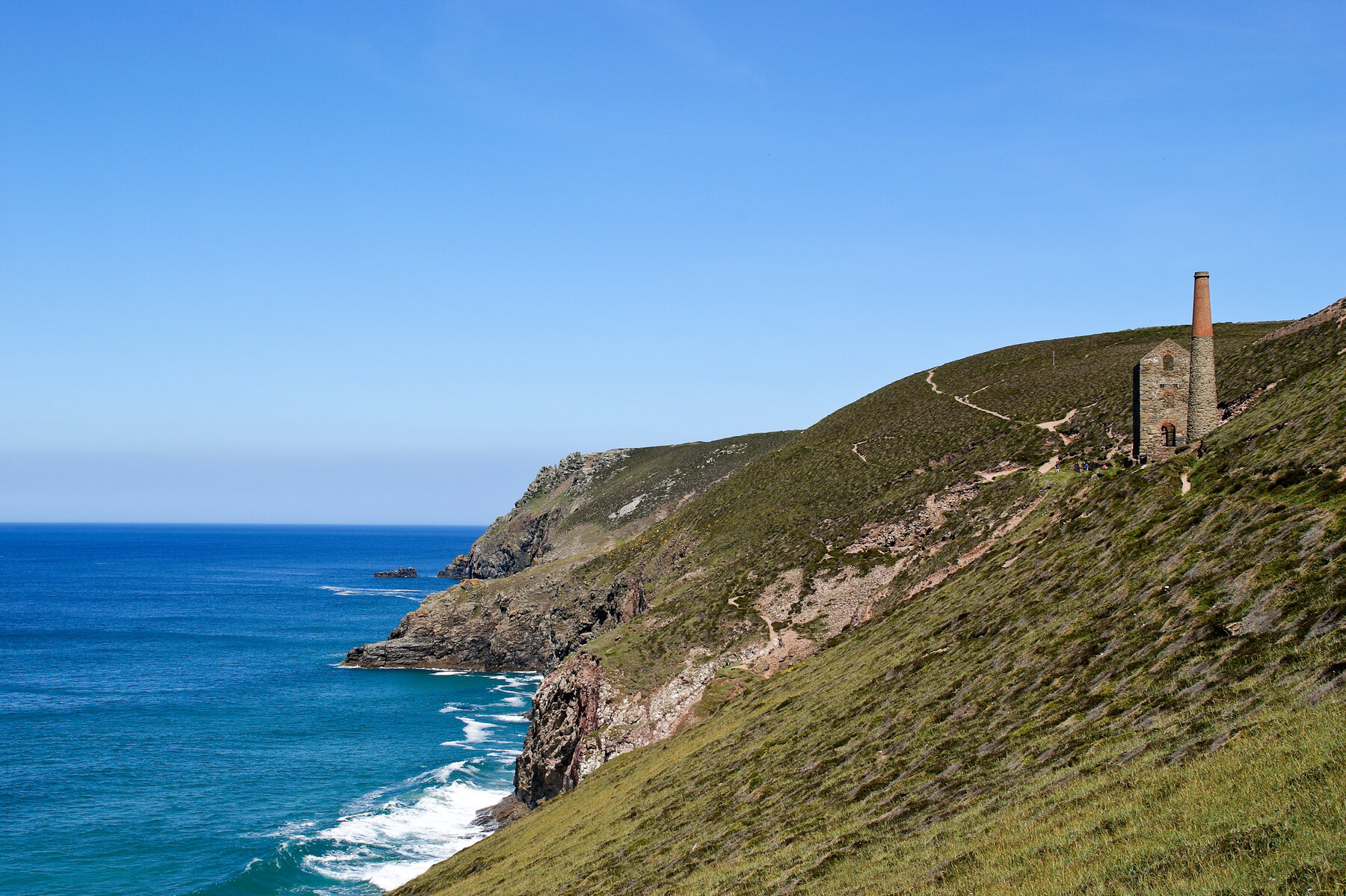 North Cornish coastline and the remains of Wheal Coates above the sea near St Agnes